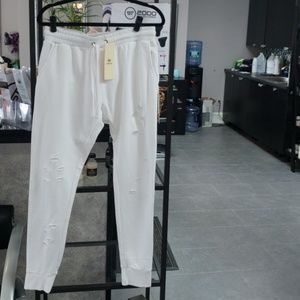 White torn joggers